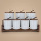 طقم علب بهارات رخام السيف غاليري، 7 قطع، غطاء، ستاند خشبي - أبيض product image 1