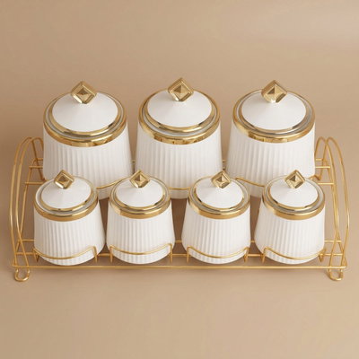 طقم علب بهارات بورسلان السيف غاليري، 7 قطع، ستاند ذهبي - أبيض product image 1