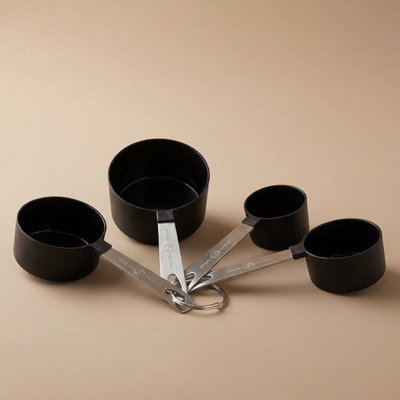 Al Saif Gallery Plastic standard spoon set, steel handle, 4 pieces - black silver product image 1